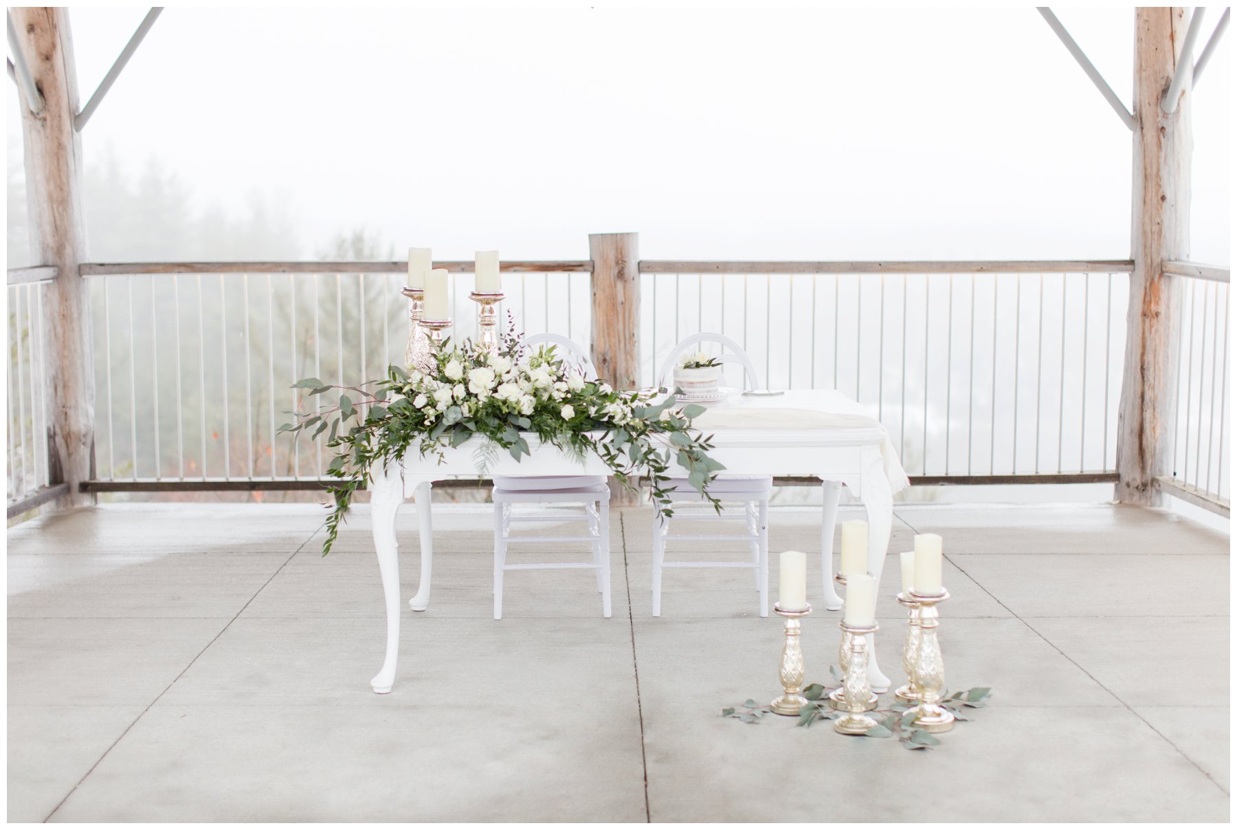 Le Belvedere Elopement Wakefield white sweetheart table with greenery and tall candles