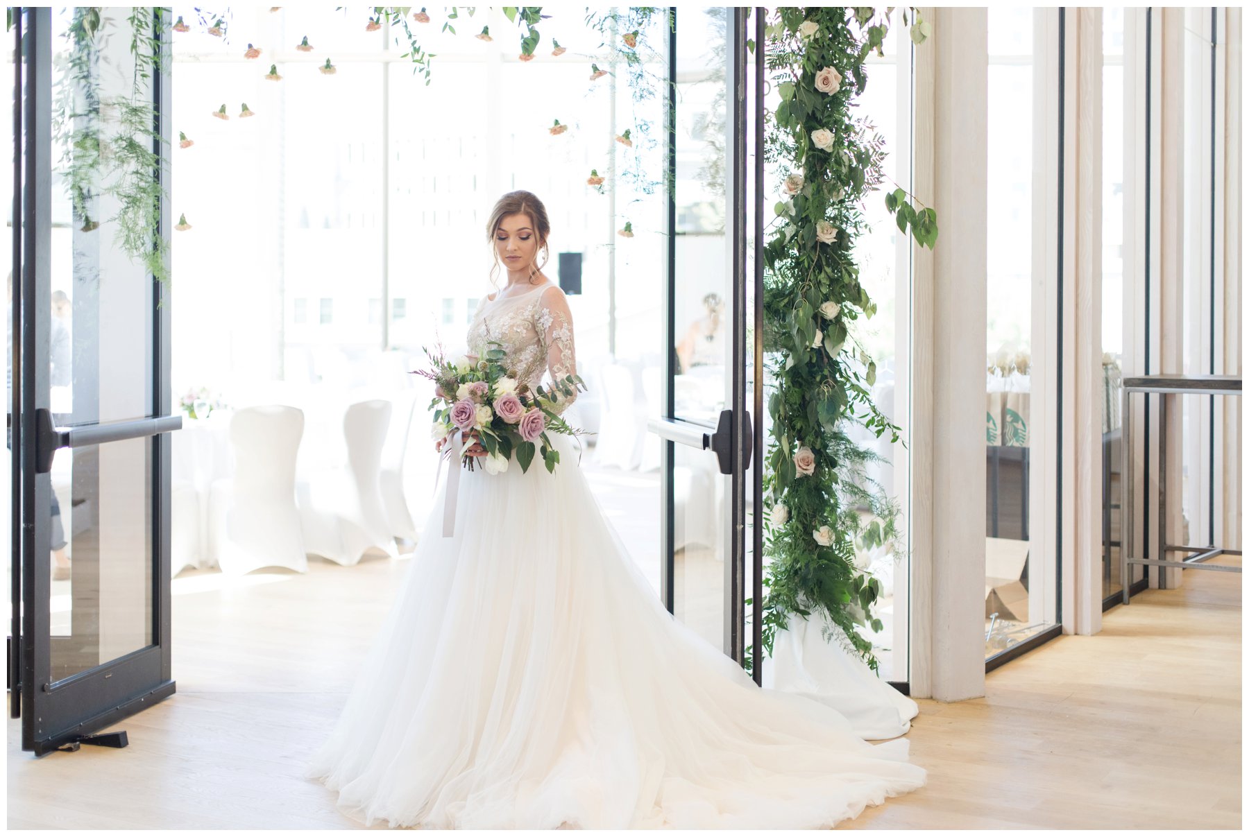 Fairytale wedding with lots of florals - Flower doorway arch by Capital Florist- Bride with white Nicole Spose’s dress from Sinders Bridal at Ottawa's NAC O'Born room wedding venue: The Barnett Company - Ottawa Wedding Photographer
