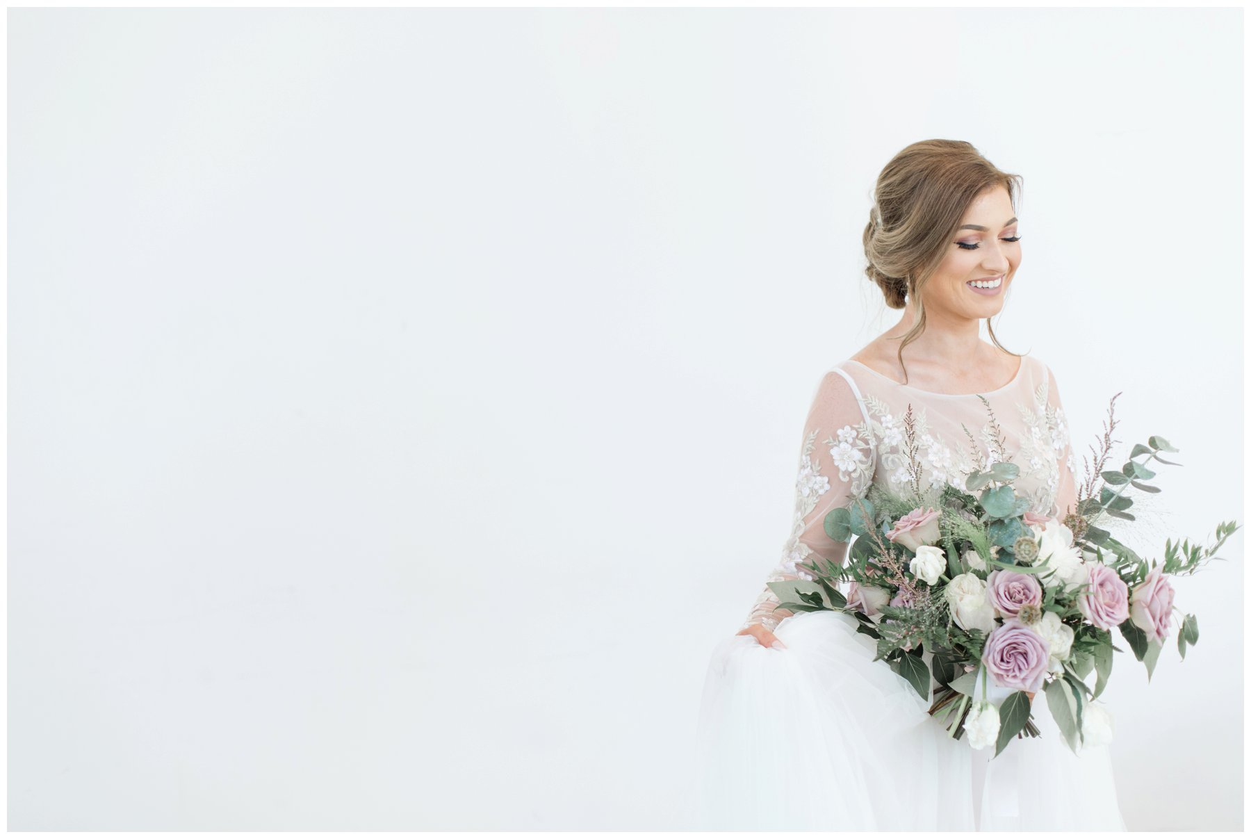 Fairytale mauve and white wedding with lots of florals by Capital Florist- Bride with white Nicole Spose’s dress from Sinders Bridal at Ottawa's NAC O'Born room wedding venue: The Barnett Company - Ottawa Wedding Photographer