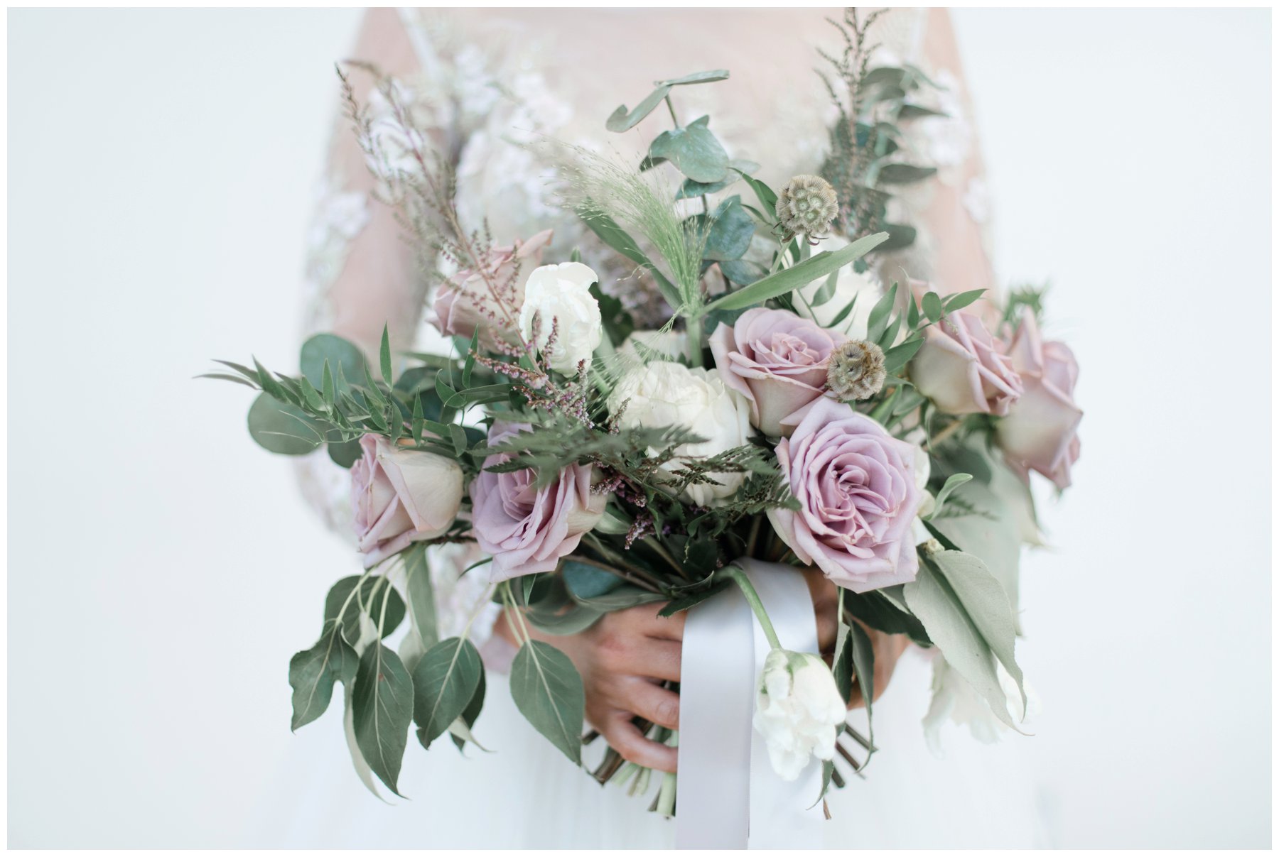Fairytale mauve and white wedding with lots of florals by Capital Florist- Bride with white Nicole Spose’s dress from Sinders Bridal at Ottawa's NAC O'Born room wedding venue: The Barnett Company - Ottawa Wedding Photographer