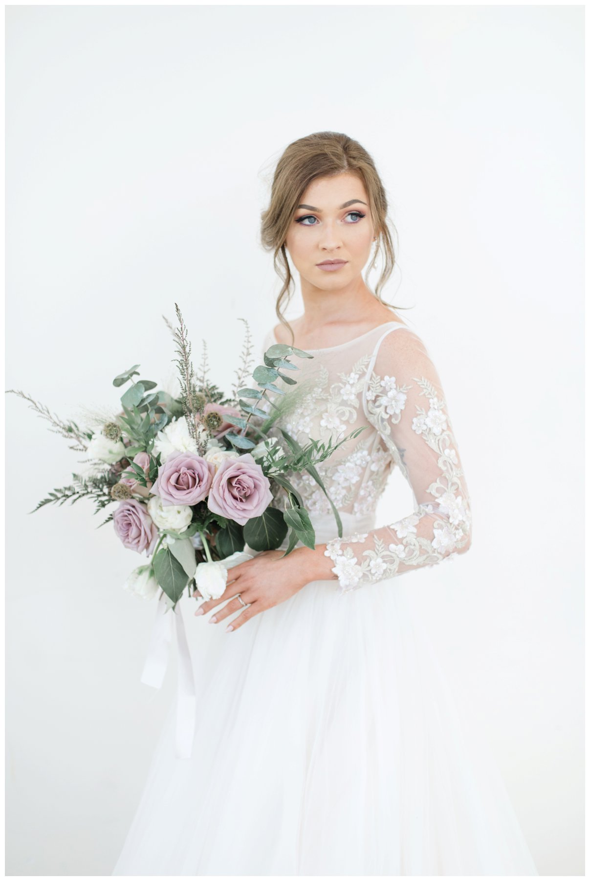 Fairytale mauve and white wedding with lots of florals by Capital Florist- Bride with white Nicole Spose’s dress from Sinders Bridal at Ottawa's NAC O'Born room wedding venue: The Barnett Company - Ottawa Wedding Photographer