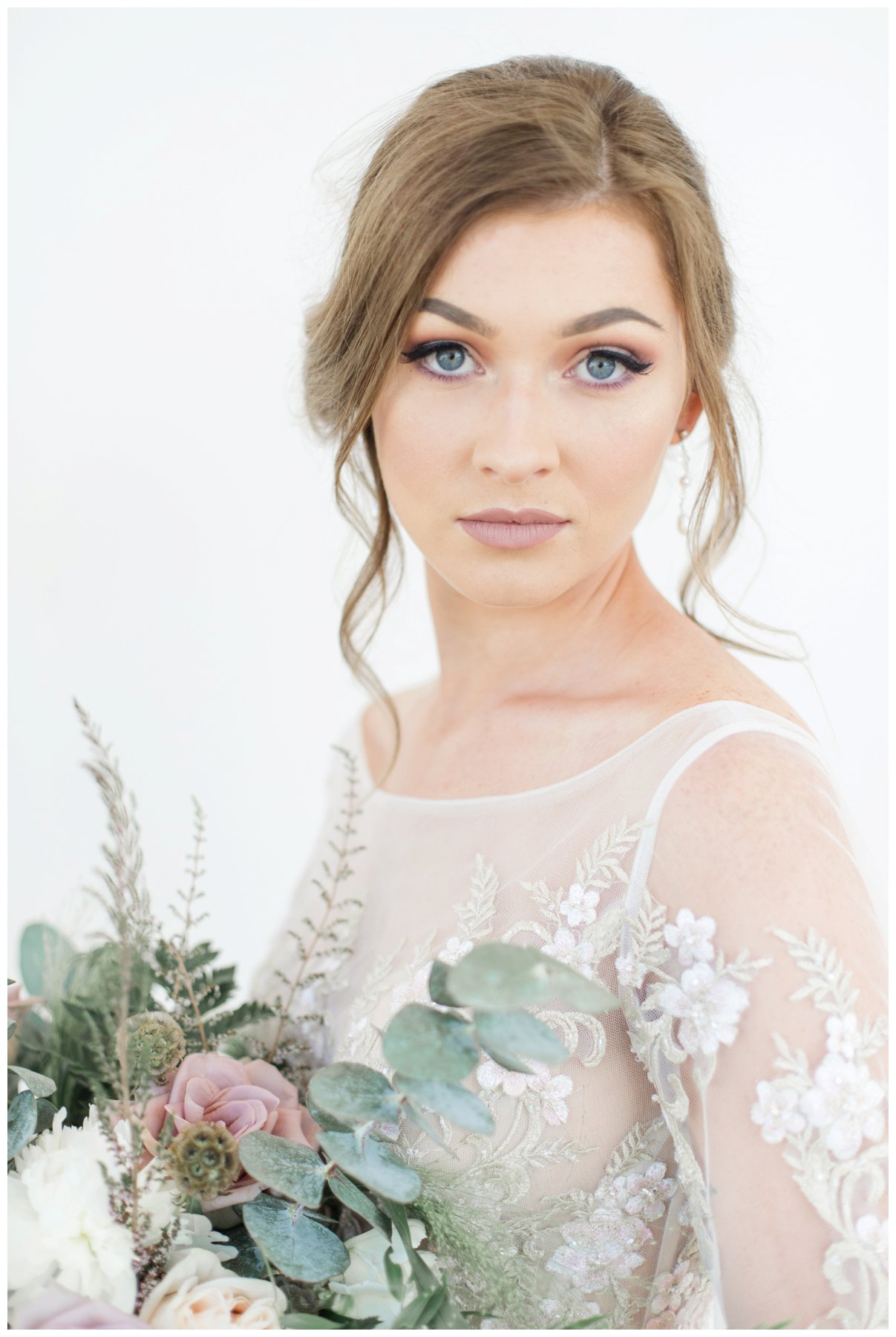 Fairytale mauve and white wedding with lots of florals by Capital Florist- Bride with white Nicole Spose’s dress from Sinders Bridal at Ottawa's NAC O'Born room wedding venue: The Barnett Company - Ottawa Wedding Photographer