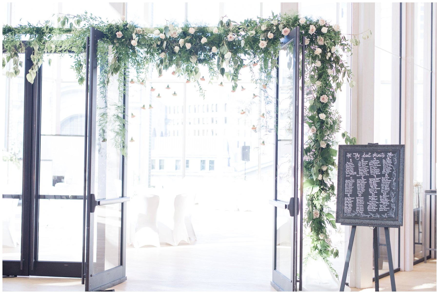 Fairytale wedding with lots of florals - Flower doorway arch at Ottawa's NAC O'Born room wedding venue: The Barnett Company - Ottawa Wedding Photographer