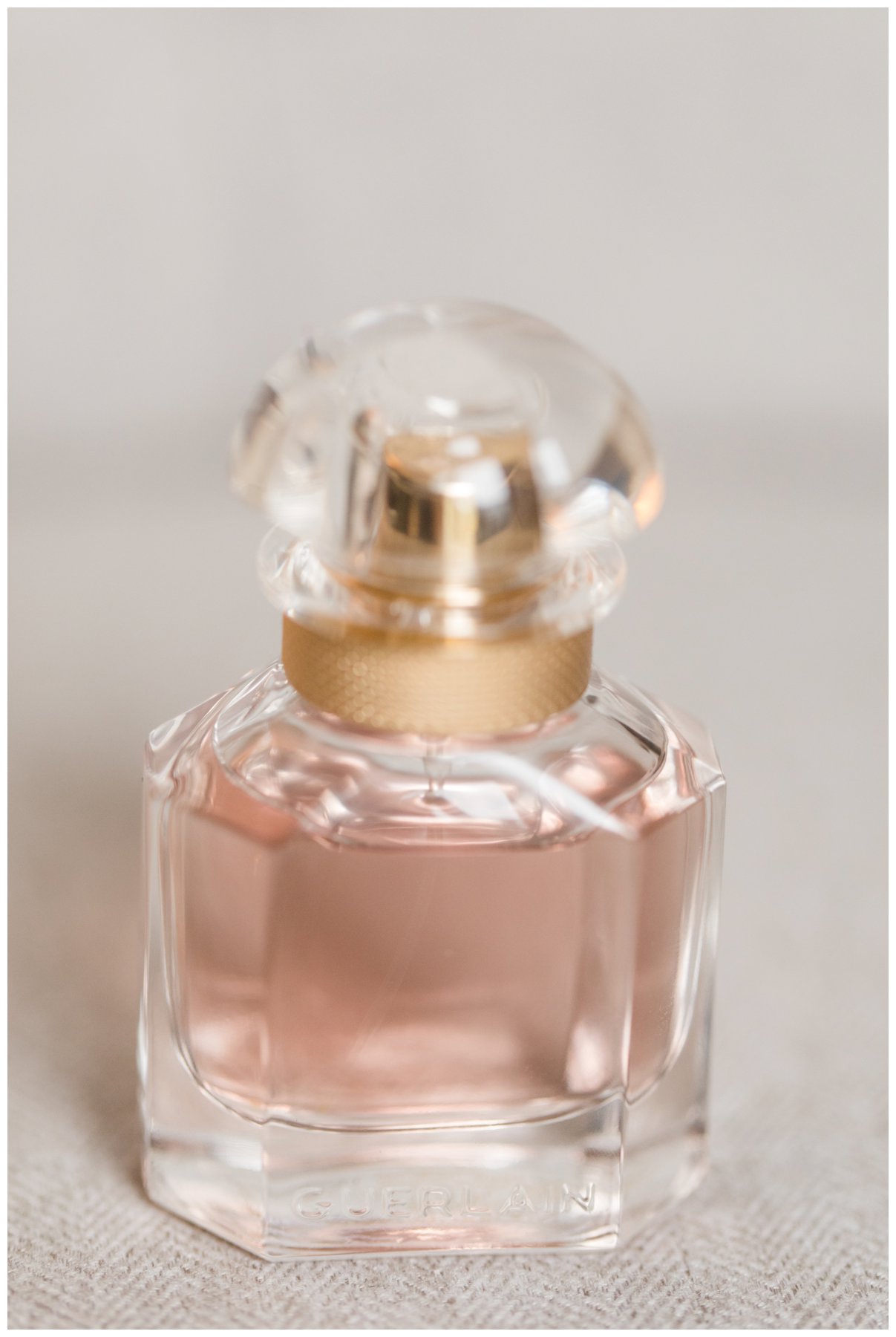 soft pink perfume bottle photo
