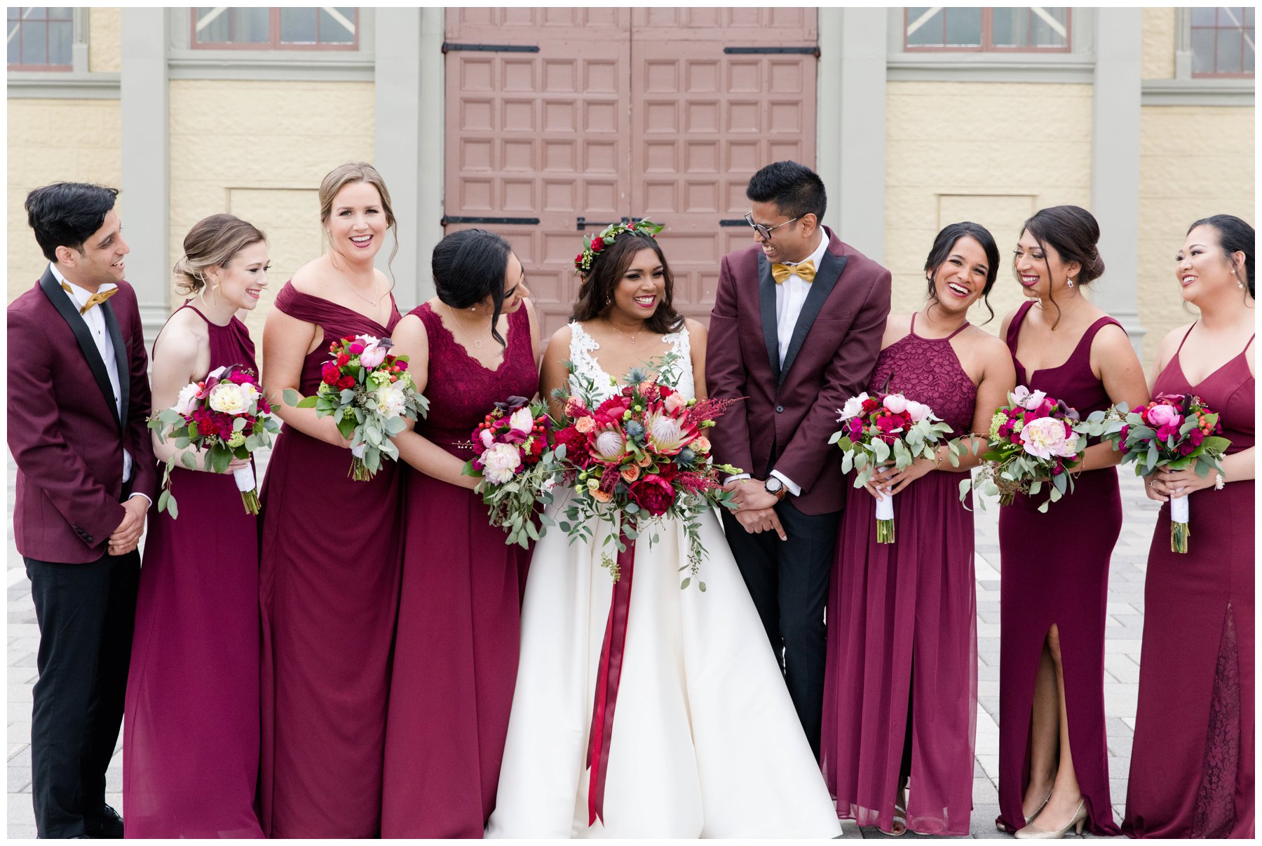 Burgundy bridesmaids and bridesman at the Horticulture Building
