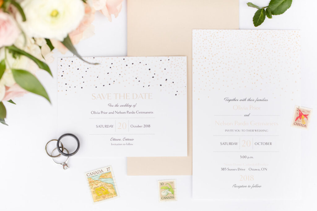 Paper invitation with rings and stamps